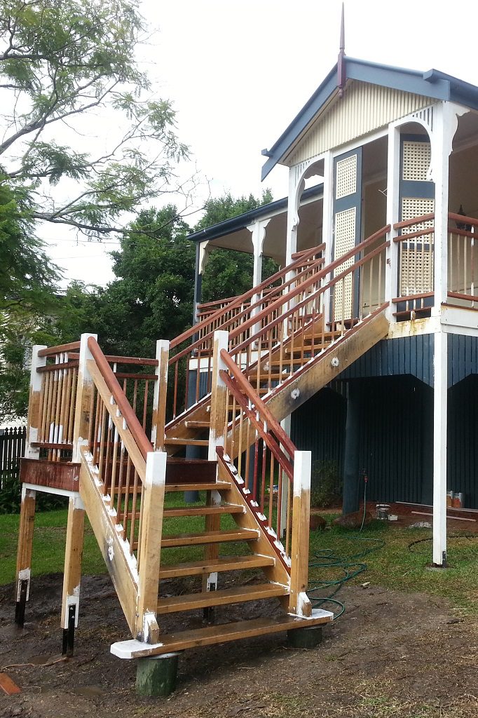 External timber staircase under construction on a Queenslander home in Brisbane