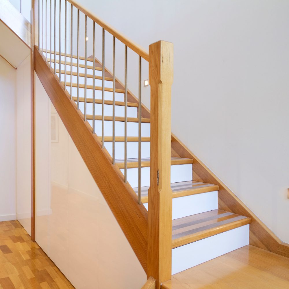 Modern timber staircase with floating treads and minimalist design in Brisbane home