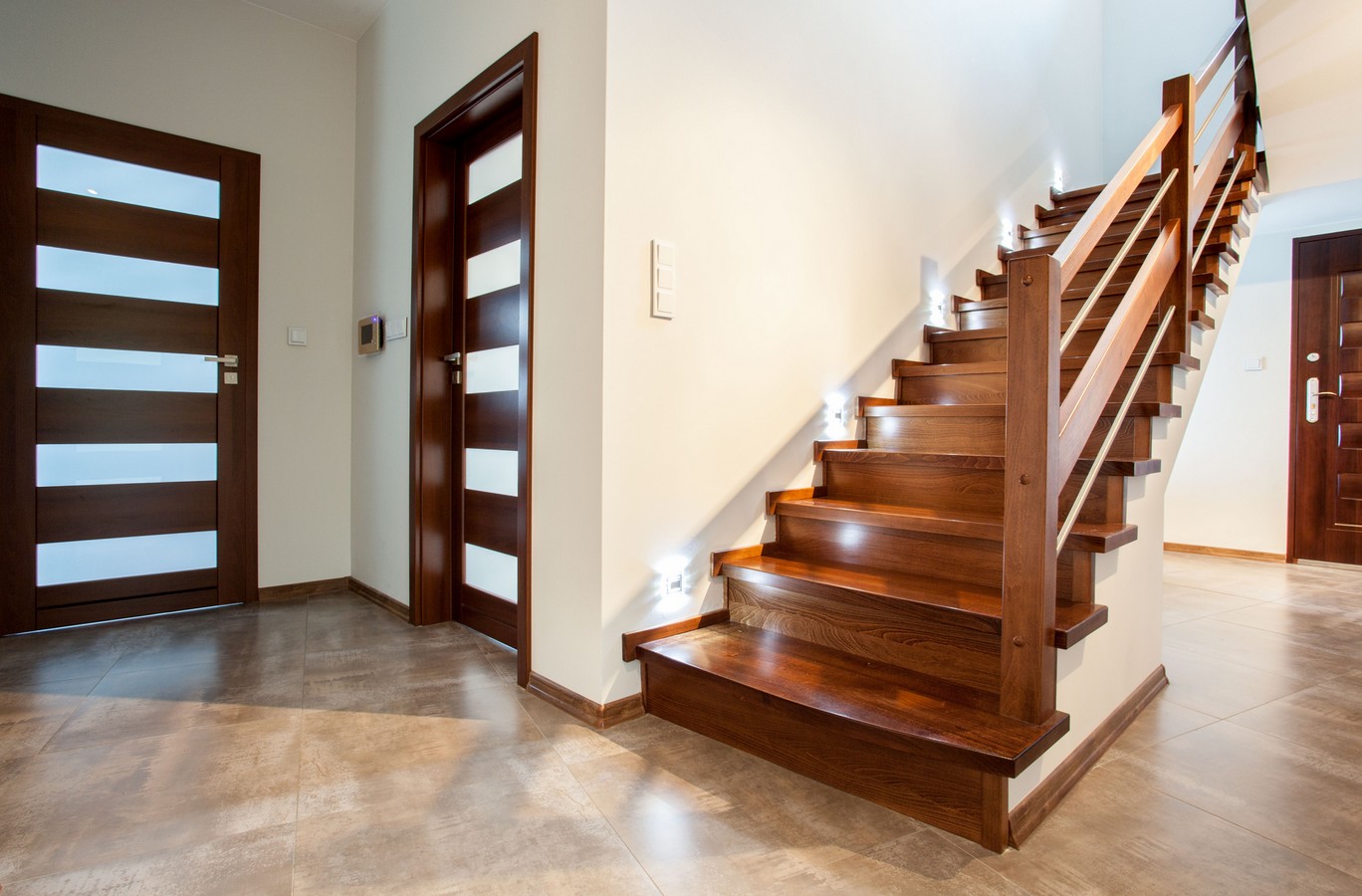 LED strip lighting illuminating timber staircase treads for safety in a Queensland home